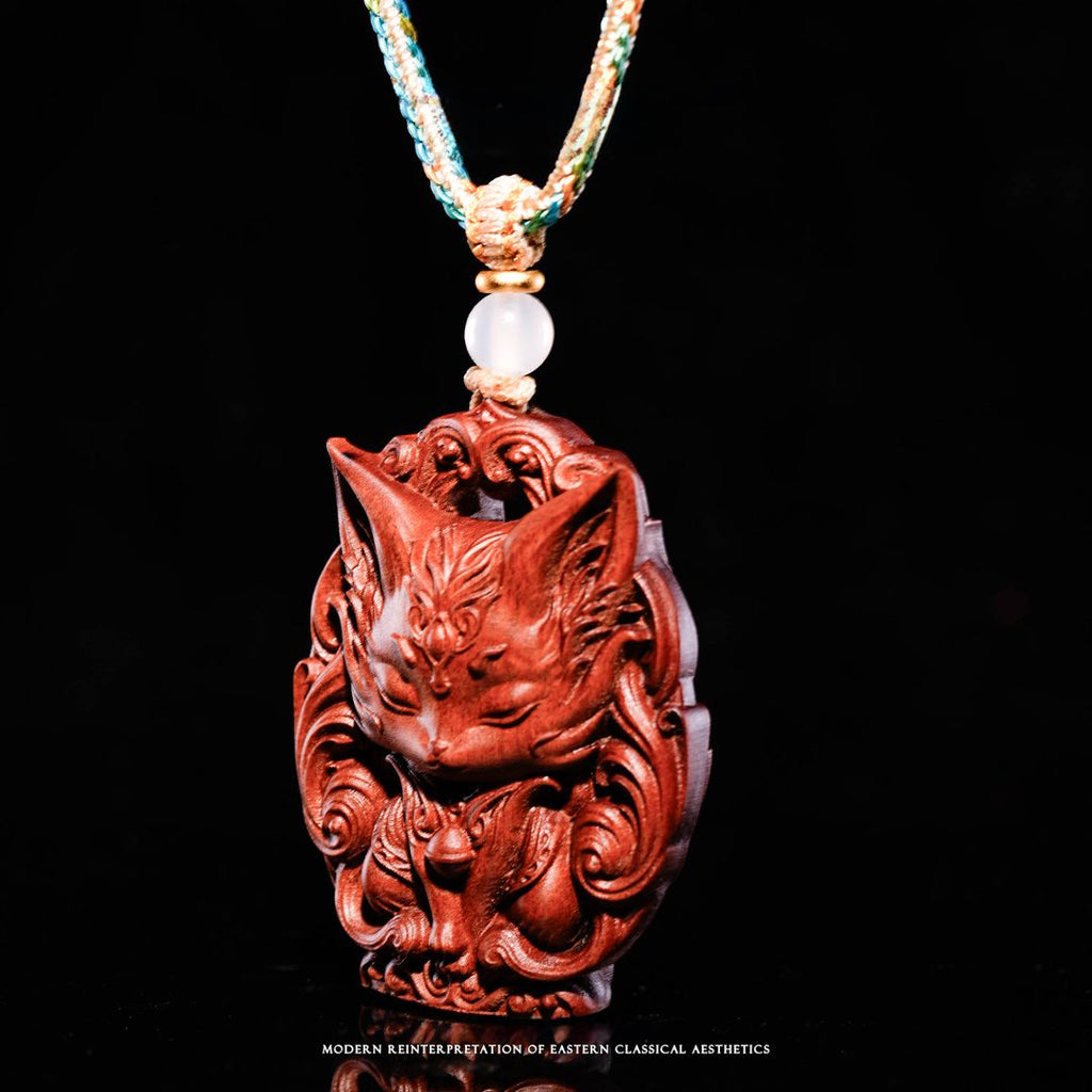 Small three-dimensional wooden sculpture of the Nine-Tailed Fox