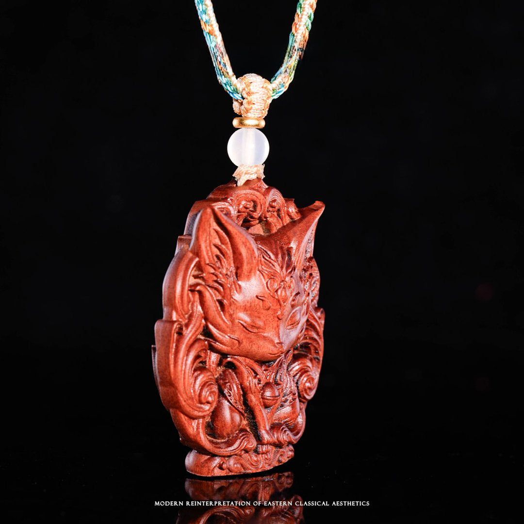 Small three-dimensional wooden sculpture of the Nine-Tailed Fox