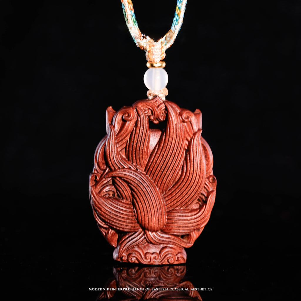 Small three-dimensional wooden sculpture of the Nine-Tailed Fox