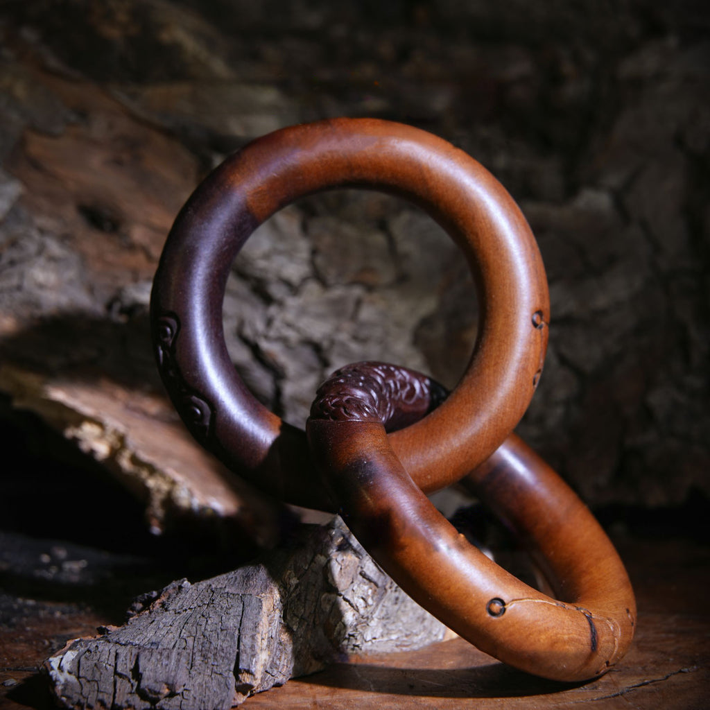 Hand-Carved Qiankun Ring – Thunderstruck Wood