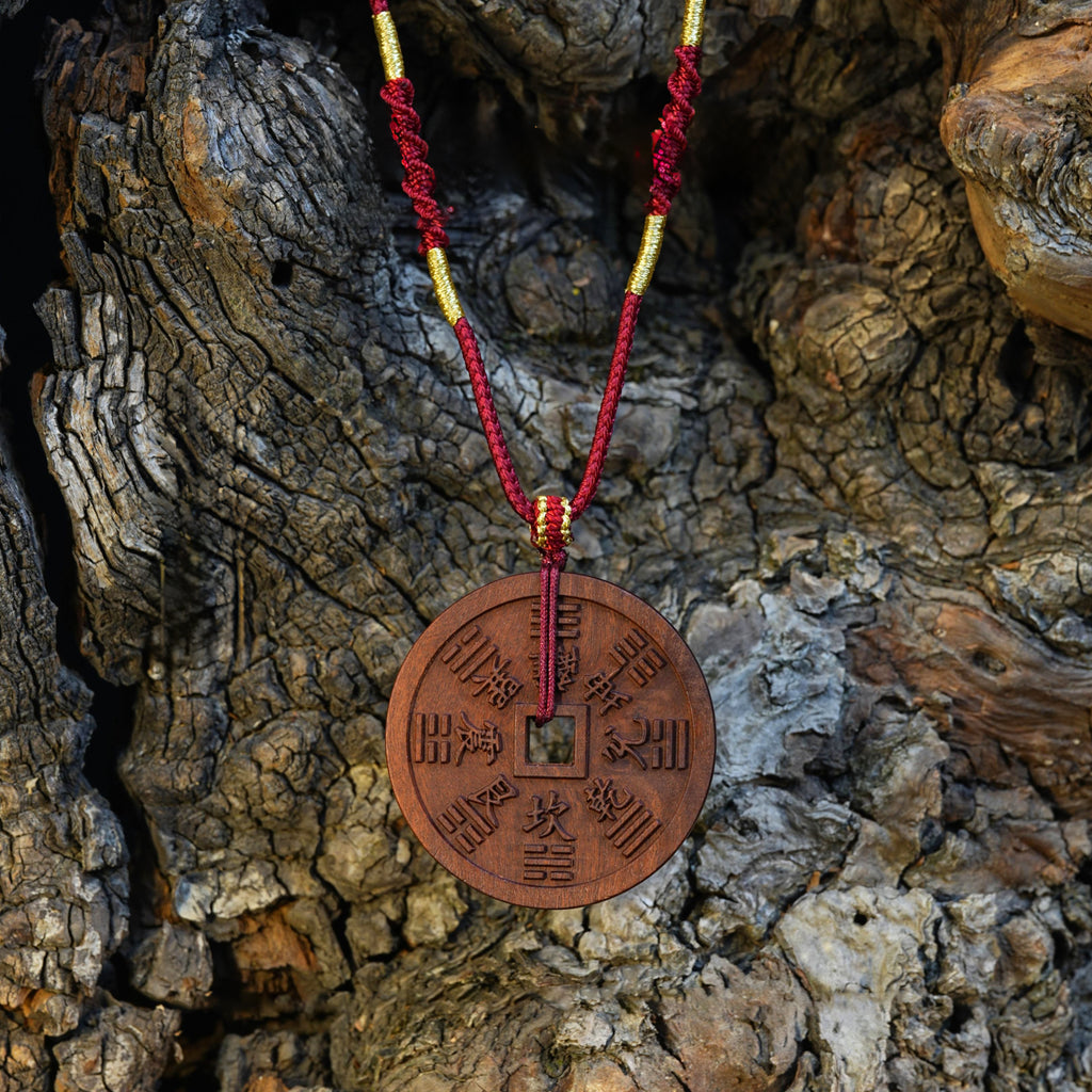 Wooden carving of a Shan Gui Huāqián