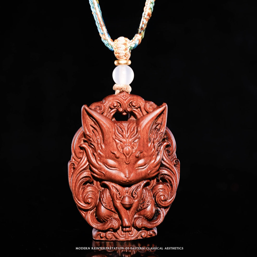 Small three-dimensional wooden sculpture of the Nine-Tailed Fox